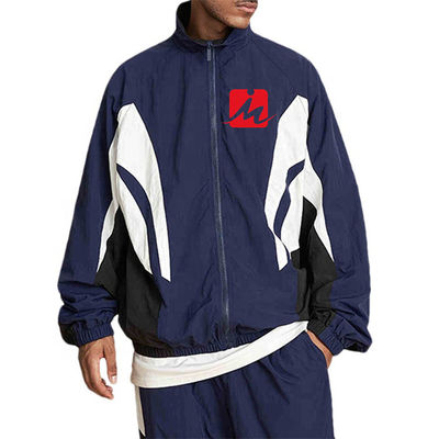 Les hommes imperméabilisent des vestes d'anorak que le polyester ferment la fermeture éclair la veste de voie de Colorblock