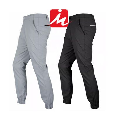 Le golf de bout droit de style de taqueur halète le pantalon wicking de golf d'humidité à séchage rapide de la ceinture des hommes